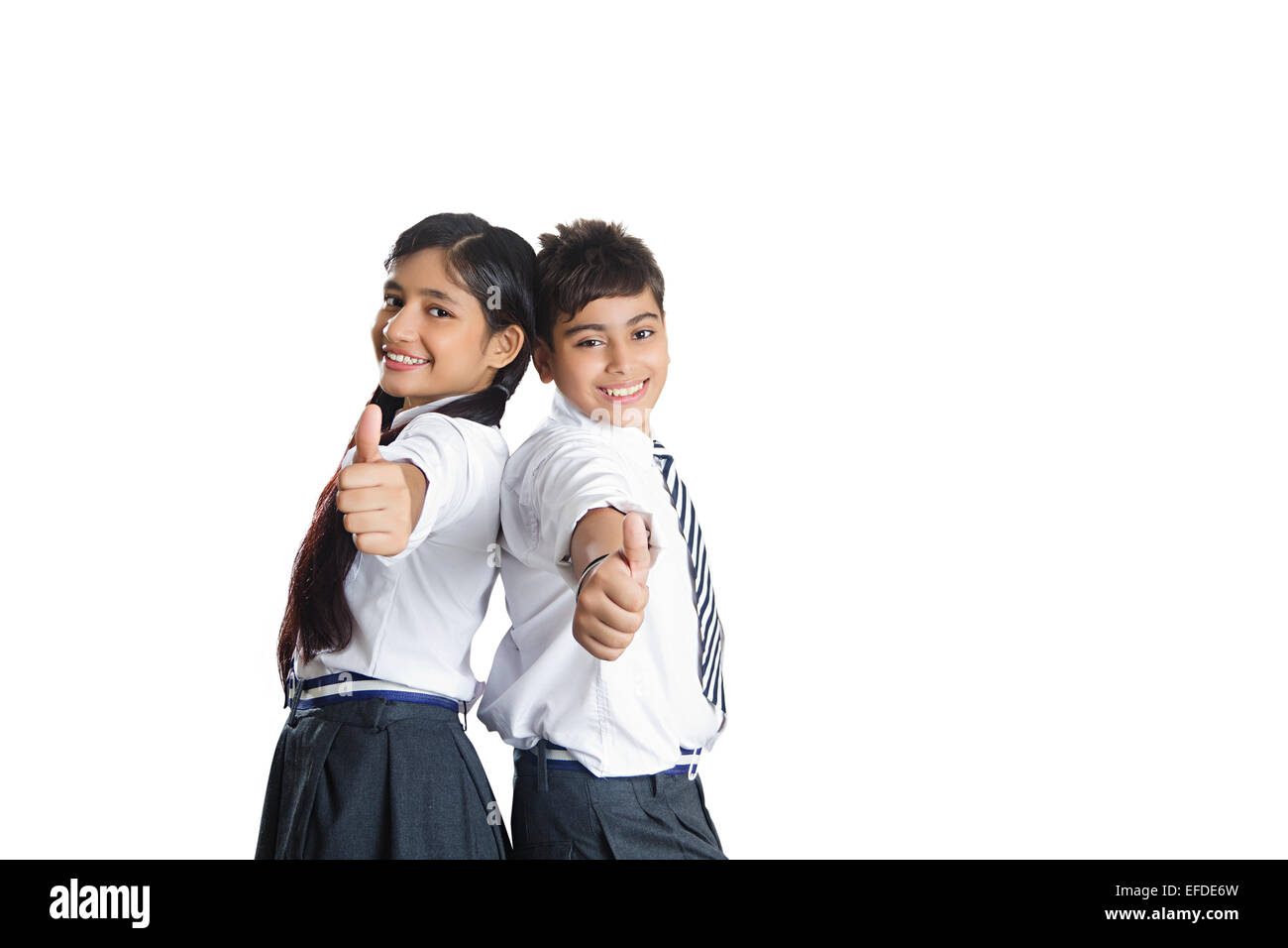 2 indian school friends students standing pose Stock Photo