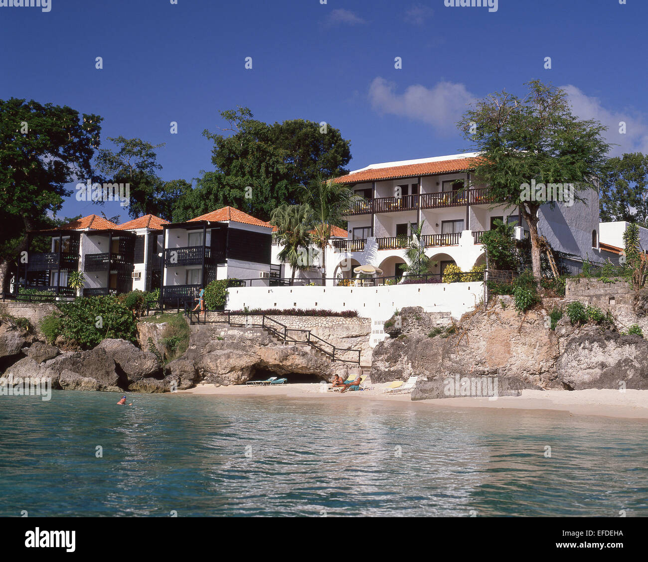 Small hotel by sea, Saint James Parish, Barbados, Lesser Antilles, Caribbean Stock Photo