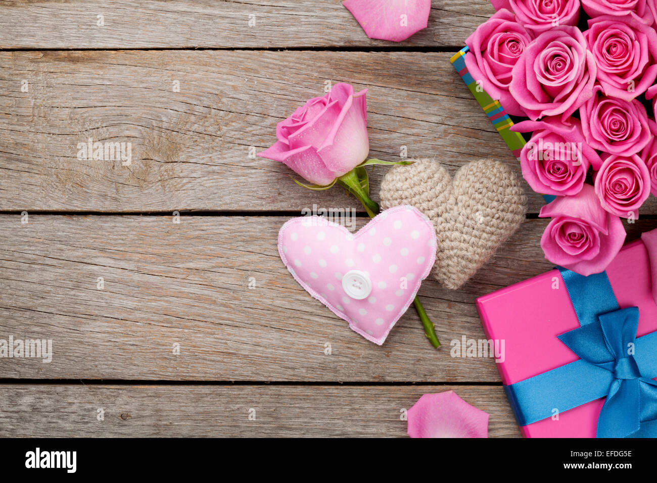 Valentines day background with gift box full of pink roses and ...