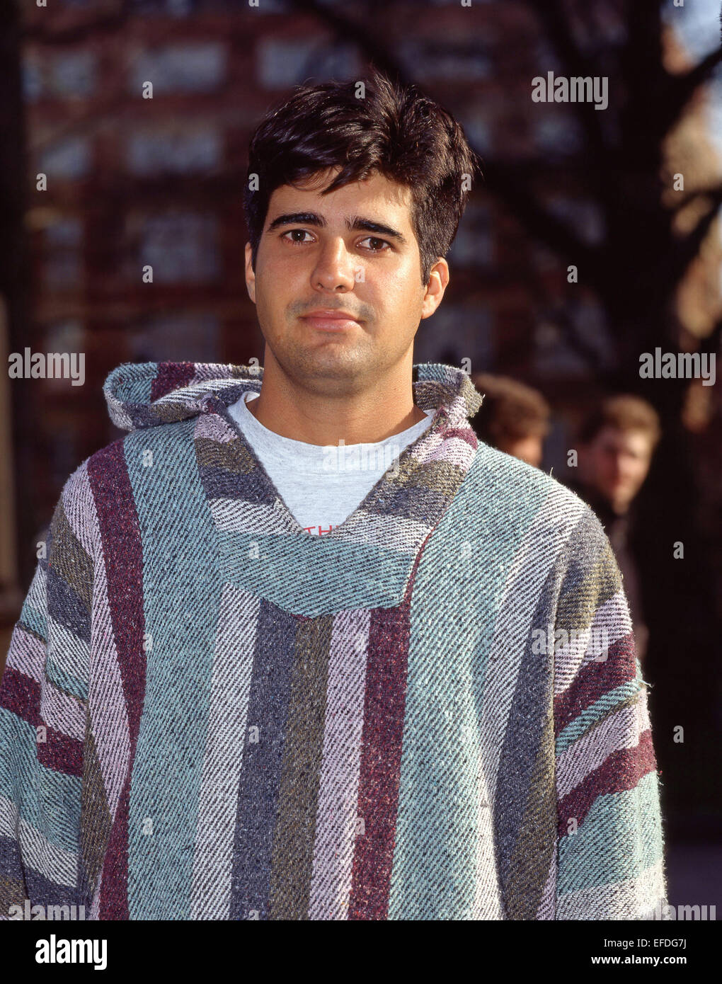 Young Brazilian male wearing kaftan, London, England, United Kingdom Stock Photo