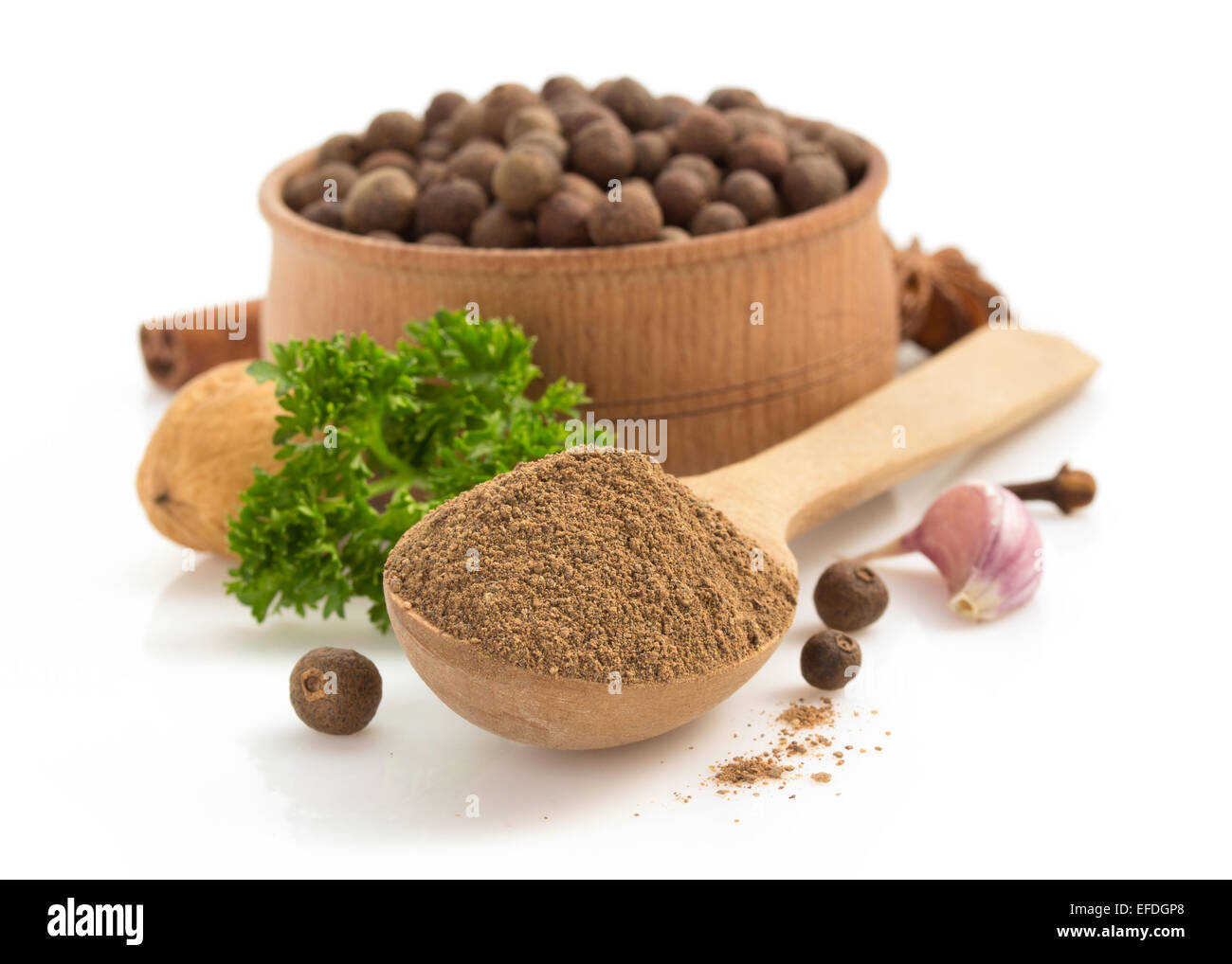 allspice in spoon isolated on white background Stock Photo Alamy