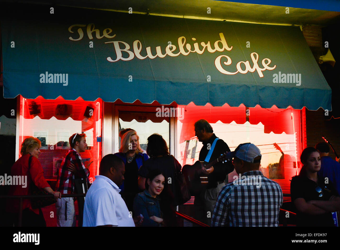 Songwriting hopefuls gather outside the famous Blue Bird Cafe for auditions on 'Open Mike' night in Nashville TN Stock Photo