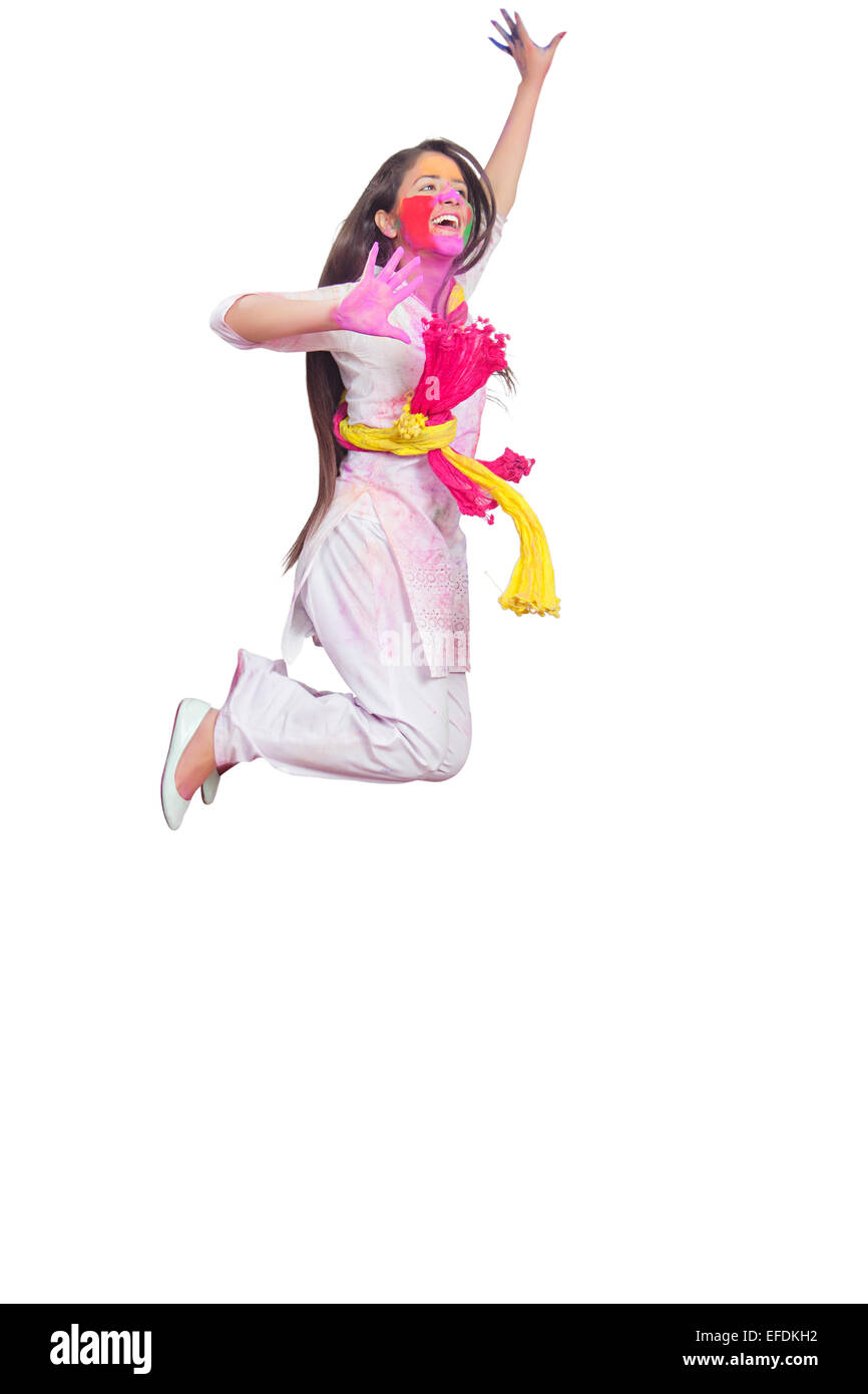 1 indian lady holi Festival Jumping Stock Photo - Alamy