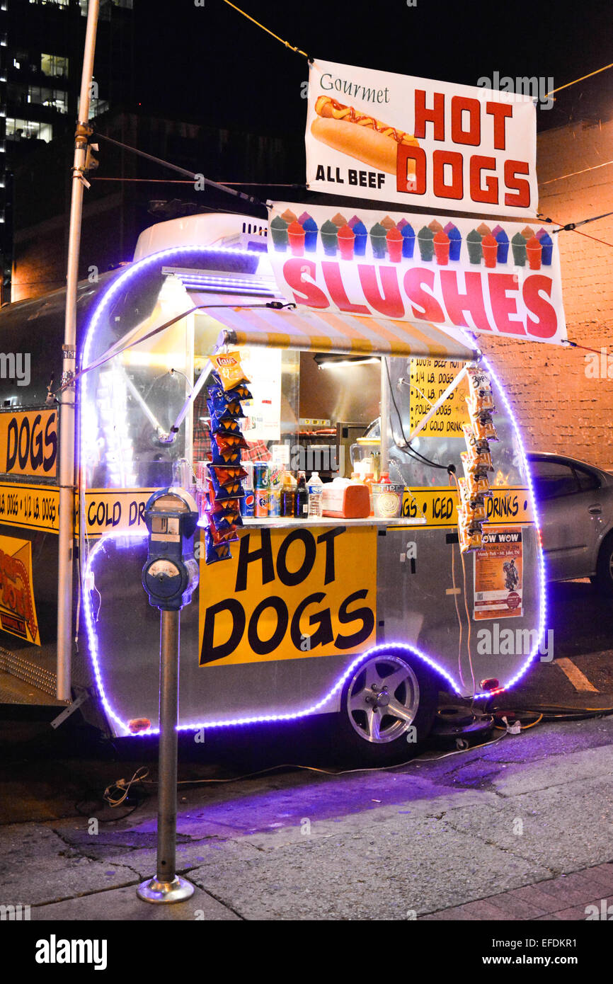 A hot dog vendor's stylish neon lit trailer on Lower Broadway in Nashville, TN, Music City USA Stock Photo