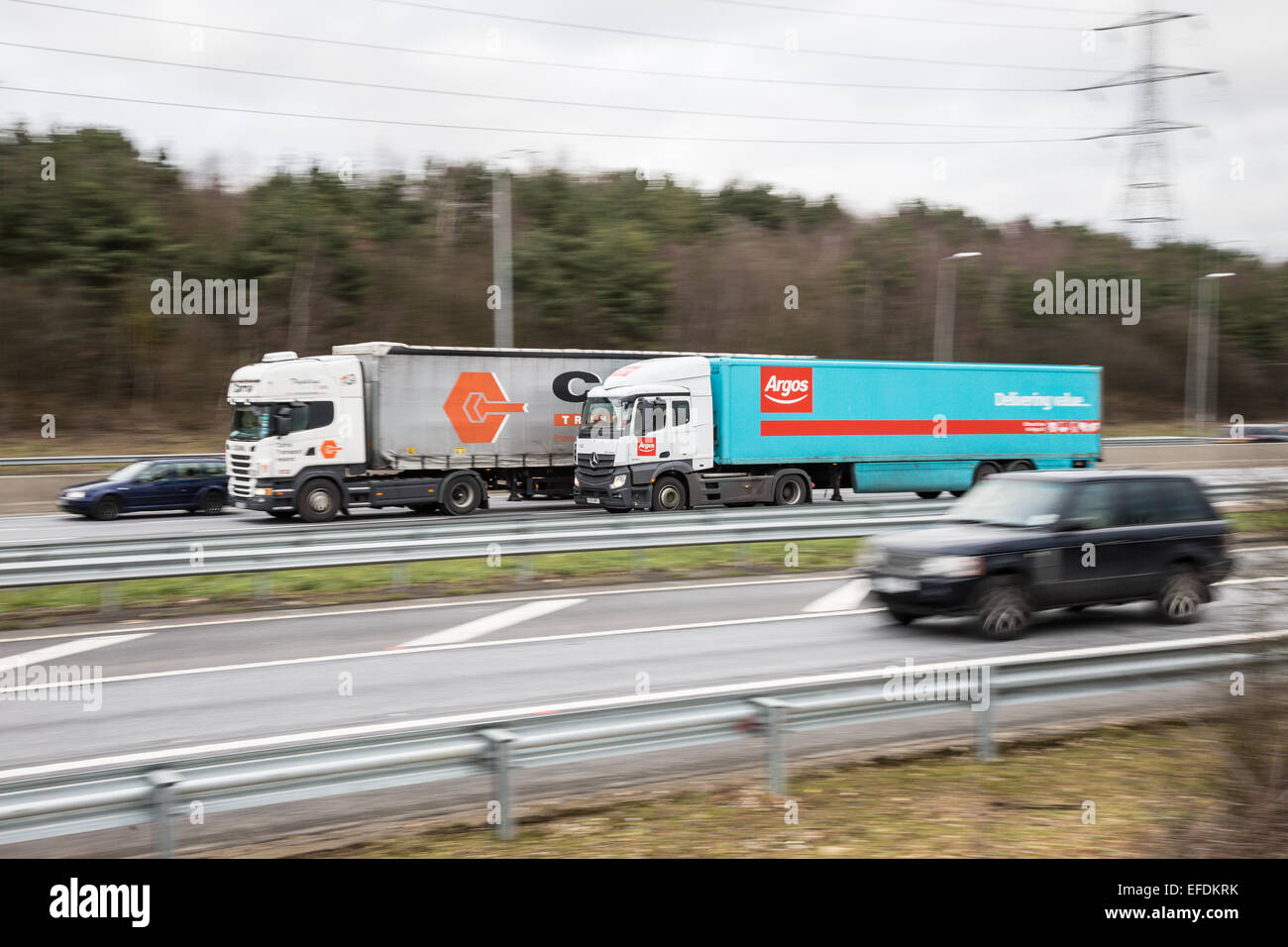 An Argos branded articulated lorry heading westbound on the M25 Motorway close to Junction 26 in Essex, United Kingdom Stock Photo