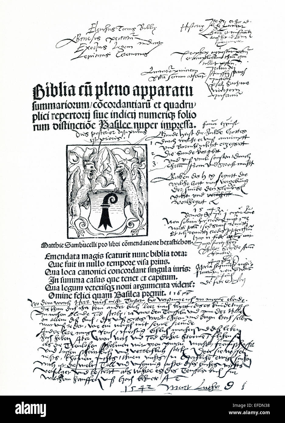 Title page of the hand Bible used by Martin Luther. The text of the Bible is in Latin. Around the text are handwritten notes. At the bottom is the date 1542 and the name Martin Luther. Stock Photo