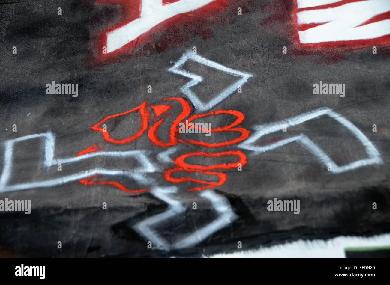 A Drawing On A Banner Shows A Hand Breaking A Swastika A Huge