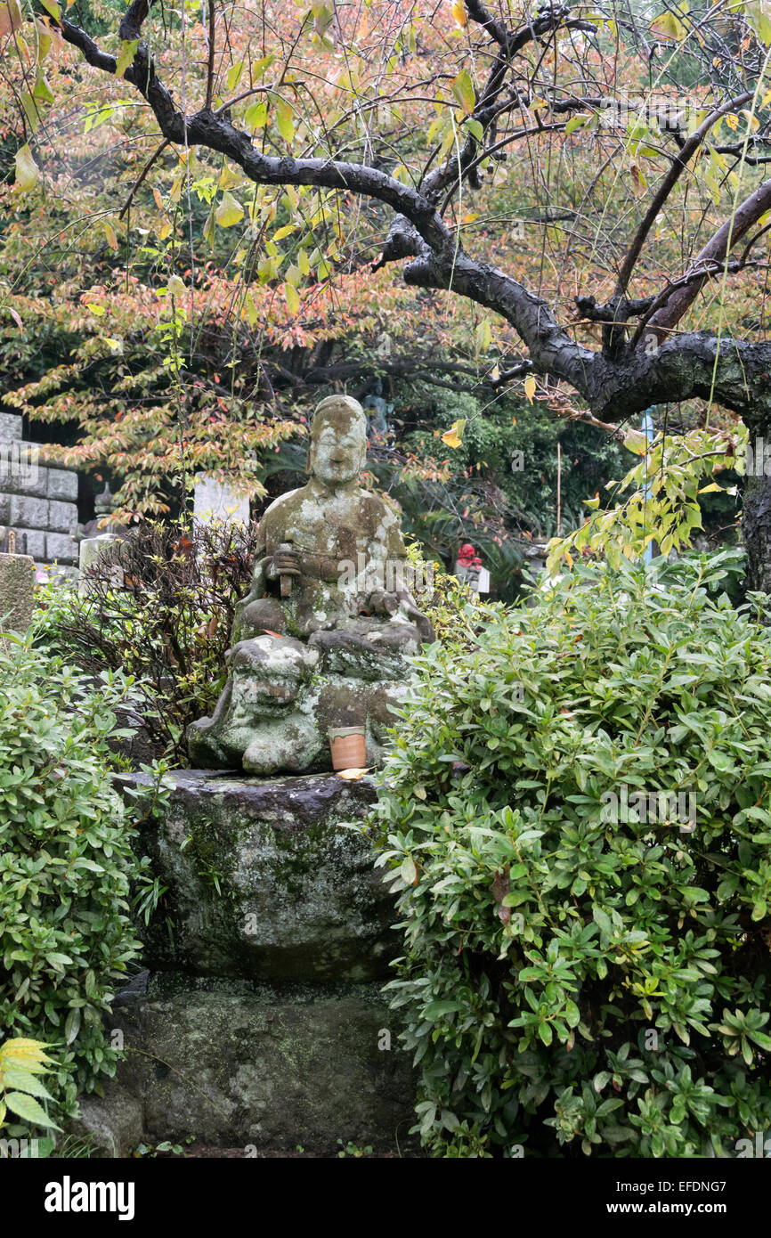 Statue of Buddha in the Japanese garden of Seiken-ji Temple, Shizuoka, Japan Stock Photo