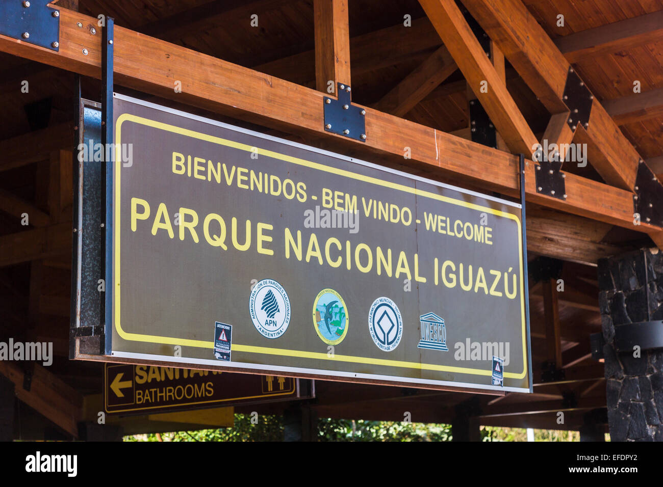 Entrance sign at Iguazu Falls National Park (Parque Nacional Iguazu) on the Argentinian side, referring to the New 7 Wonders of Nature Stock Photo