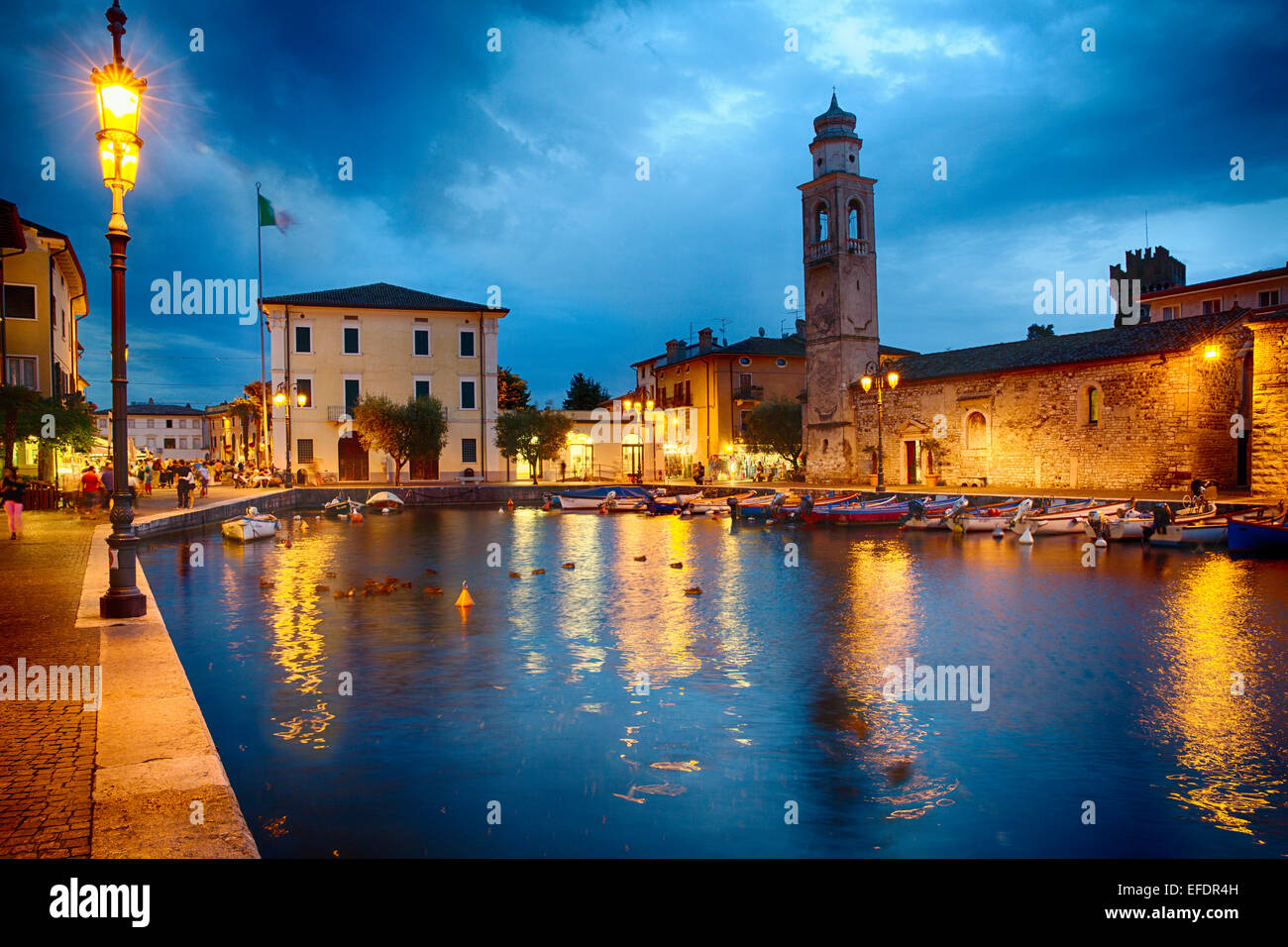 Low Angle View of a Harbor at Night, Lazise, Lake Garda, Lombardy, Italy Stock Photo