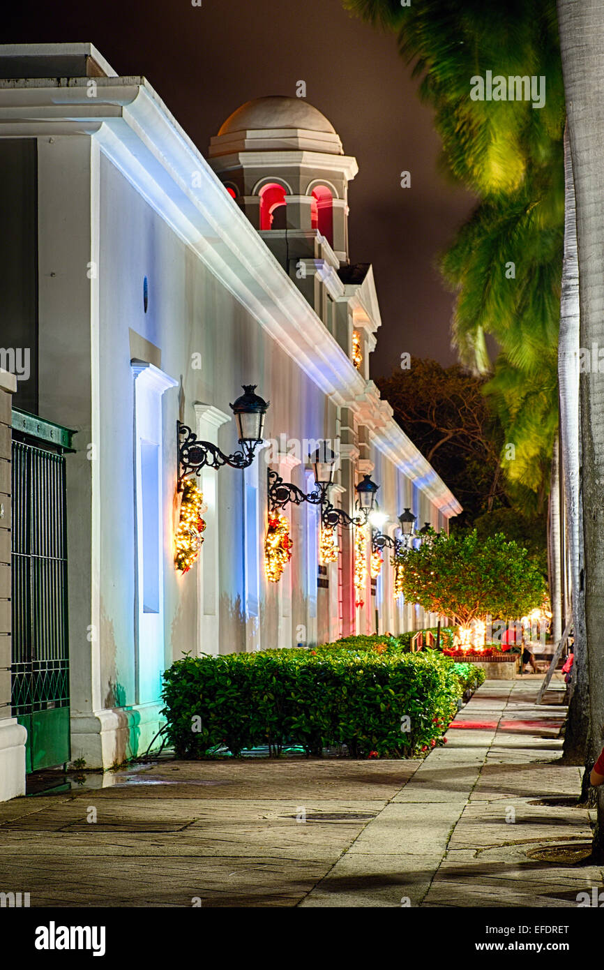 Low Angle View of the La Princesa Building with Holiday Decoration at Night, San Juan, Puerto Rico Stock Photo