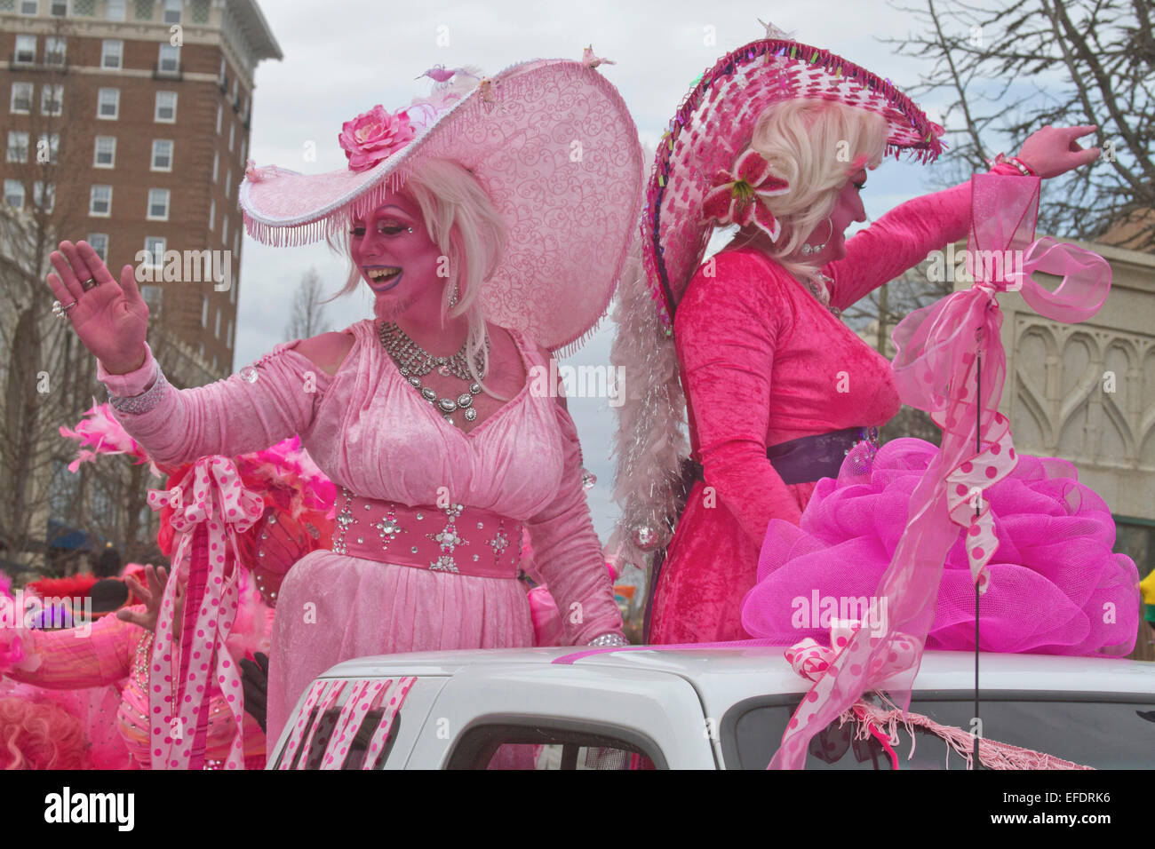 https://c8.alamy.com/comp/EFDRK6/two-frilly-costumed-ladies-all-in-pink-with-pink-skin-one-with-a-beard-EFDRK6.jpg