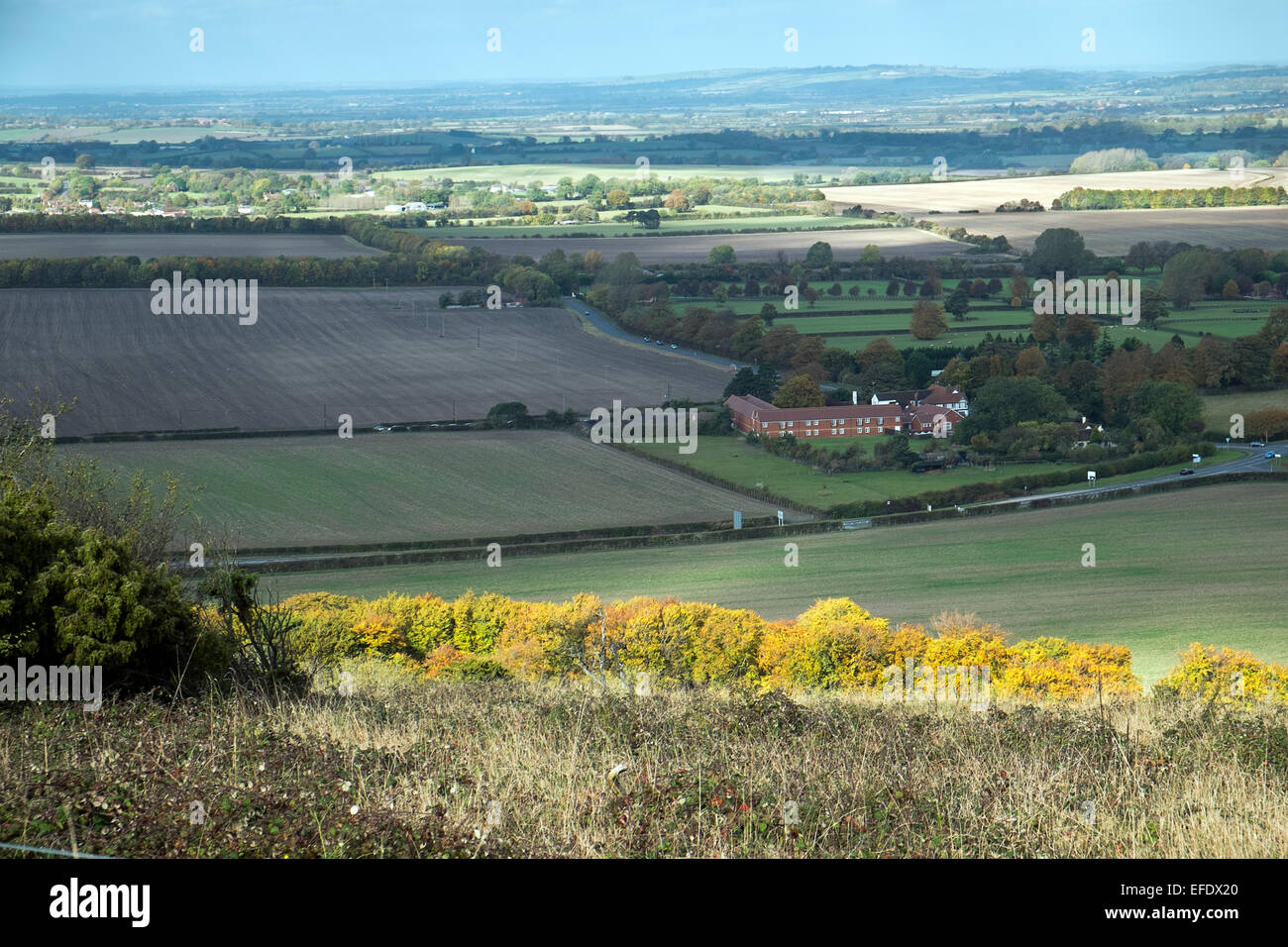 A view of a typical Chiltern landscape from Aston Rowant towards the Lambert Arms pub mid distance Stock Photo