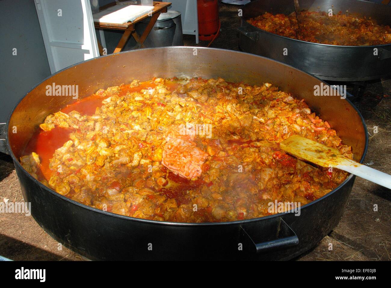 Large Paella being cooked during the Romeria San Bernabe procession