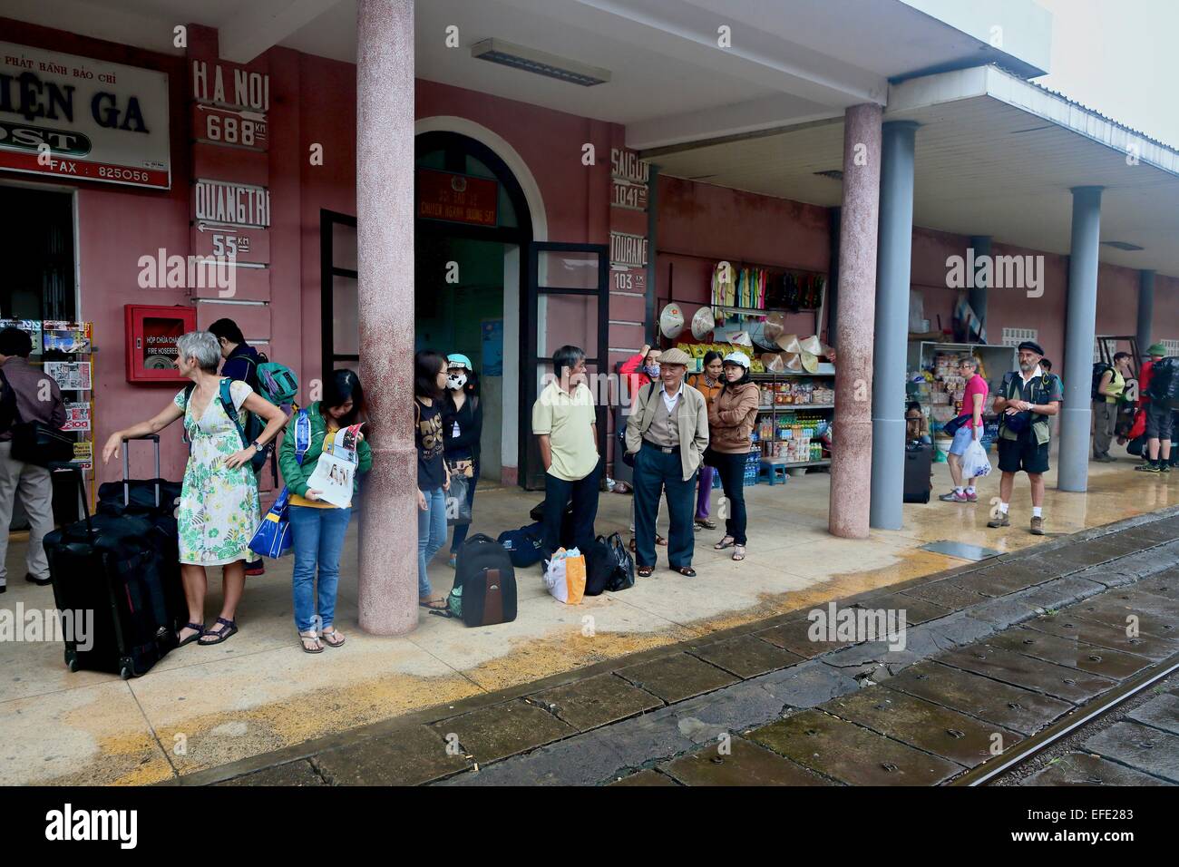 Passengers wait for the Danang train at where are Hue Railway station, Vietnam Stock Photo