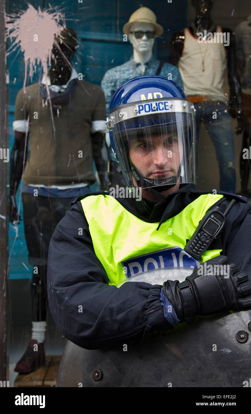 Police officer at Top Shop in Oxford Street, London during 2011 protest against corporate tax avoidance. Stock Photo