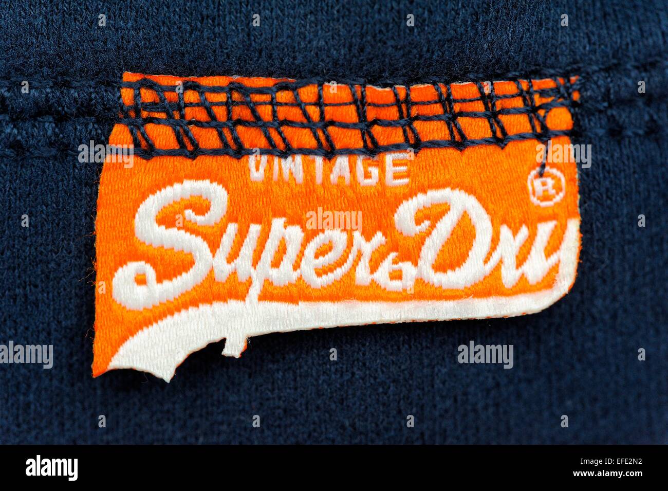 Superdry clothing label logos Stock Photo - Alamy