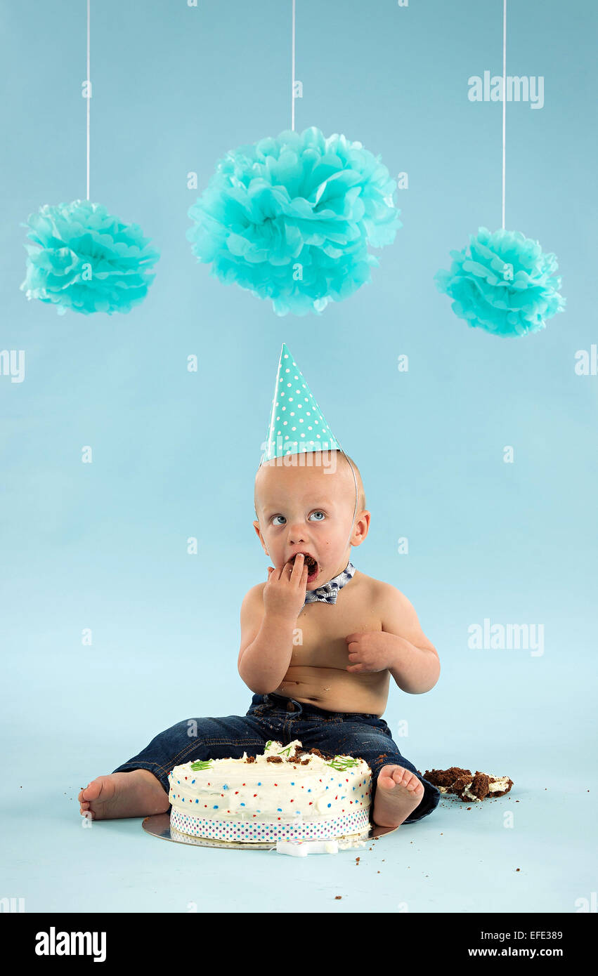 One Year Old Boys First Birthday With Chocolate Cake Stock Photo