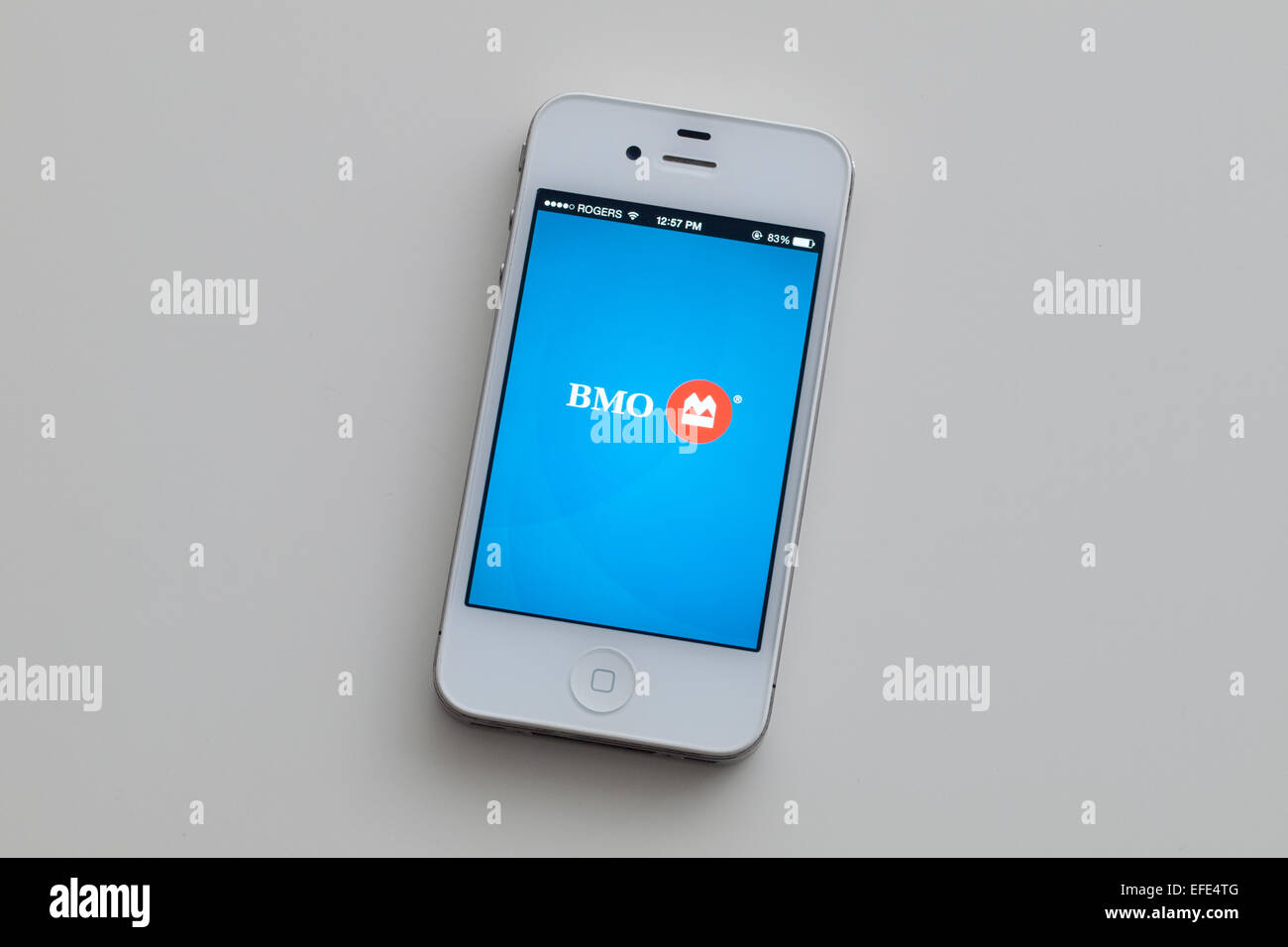 A view of the logo and homescreen of the Bank of Montreal (BMO) mobile app on an Apple iPhone 4. Stock Photo