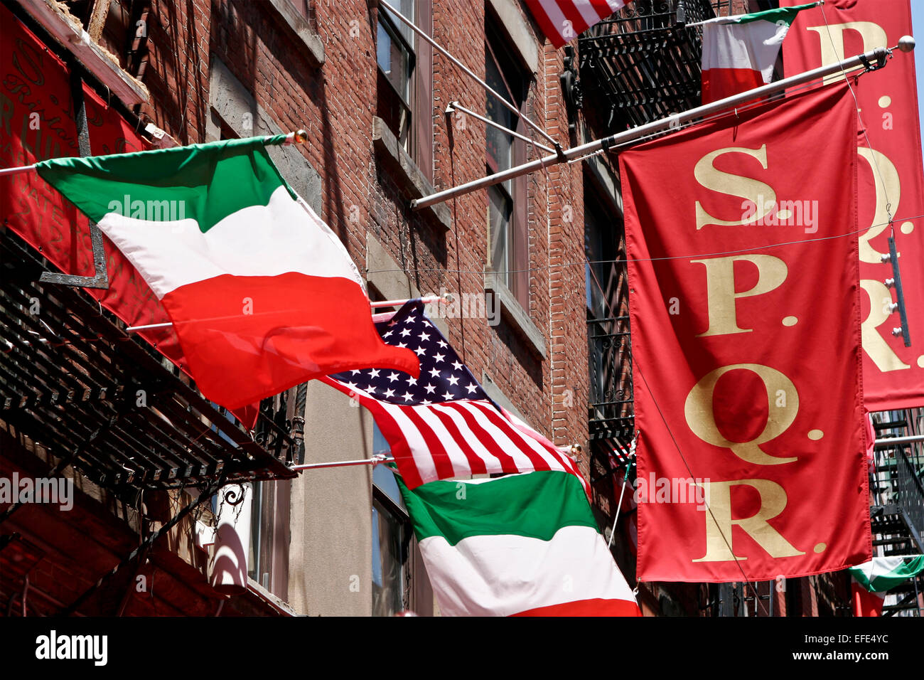 Flags, italian, american, s.p.q.r. at the colorful and picturesque Little Italy neighborhood. Manhattan, New York, NY, USA, United States of America. Stock Photo