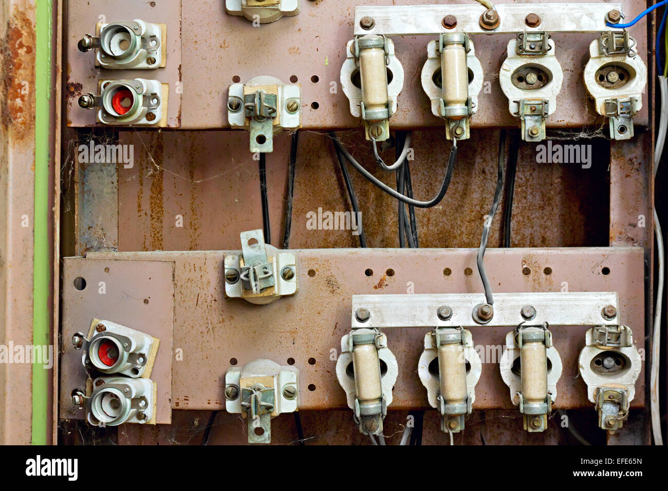 old switchboard with fuses in the background Stock Photo