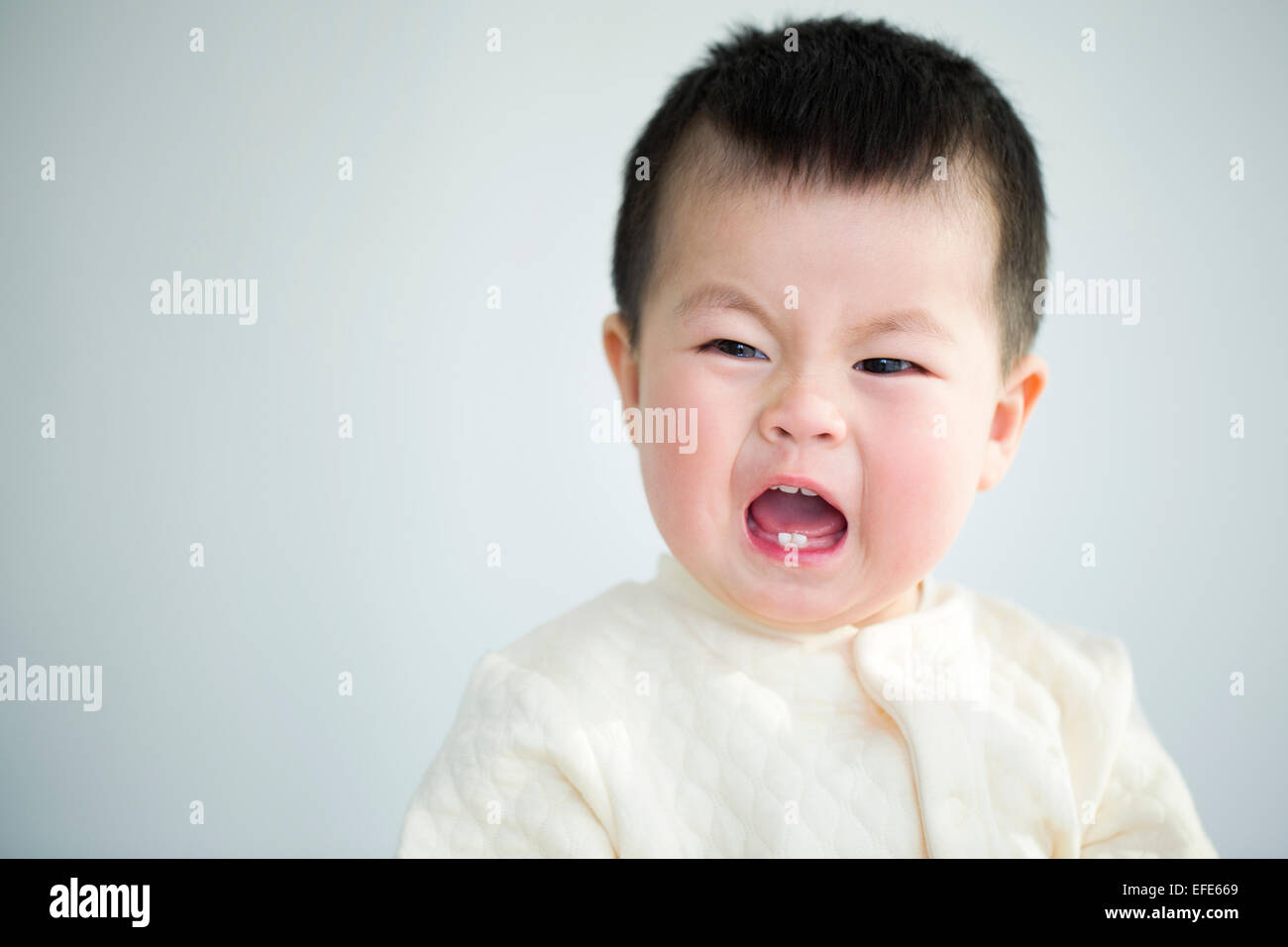 Cute baby crying Stock Photo