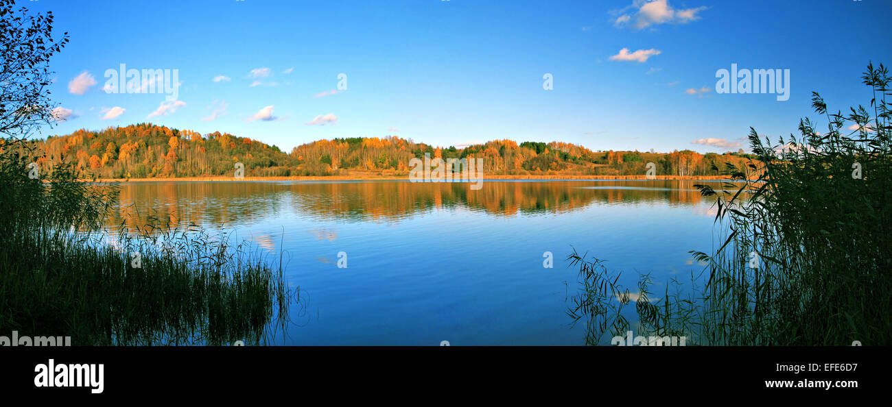 beautiful autumn panoramic landscape of lake and forest Stock Photo