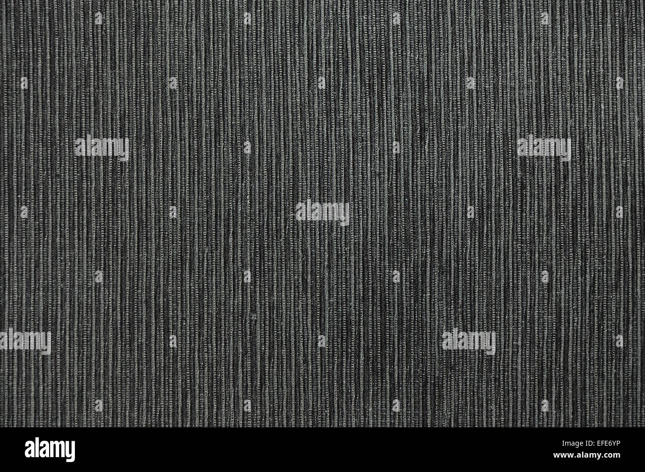 close up of an anthracite, black and gray  flecked and striped place setting, detail, full frame Stock Photo