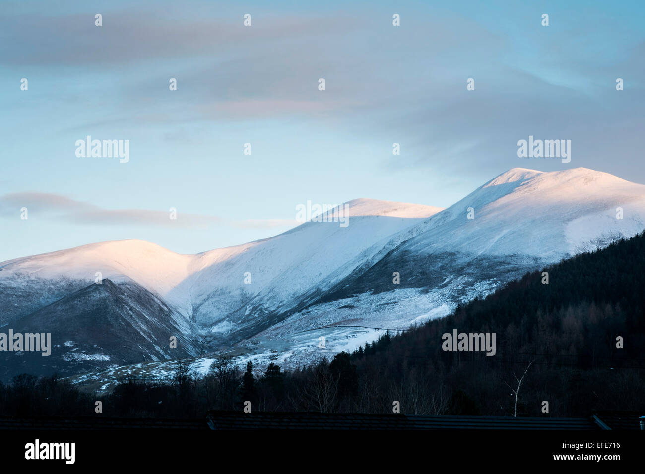 A view of a snow topped Skiddaw in the English Lake District, Cumbria as seen from Keswick. Stock Photo