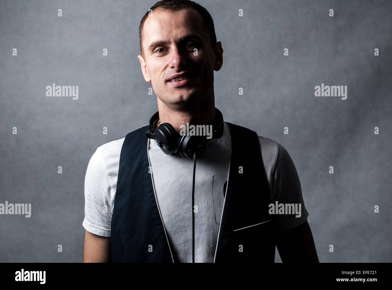 dj with headphones on white background Stock Photo Alamy