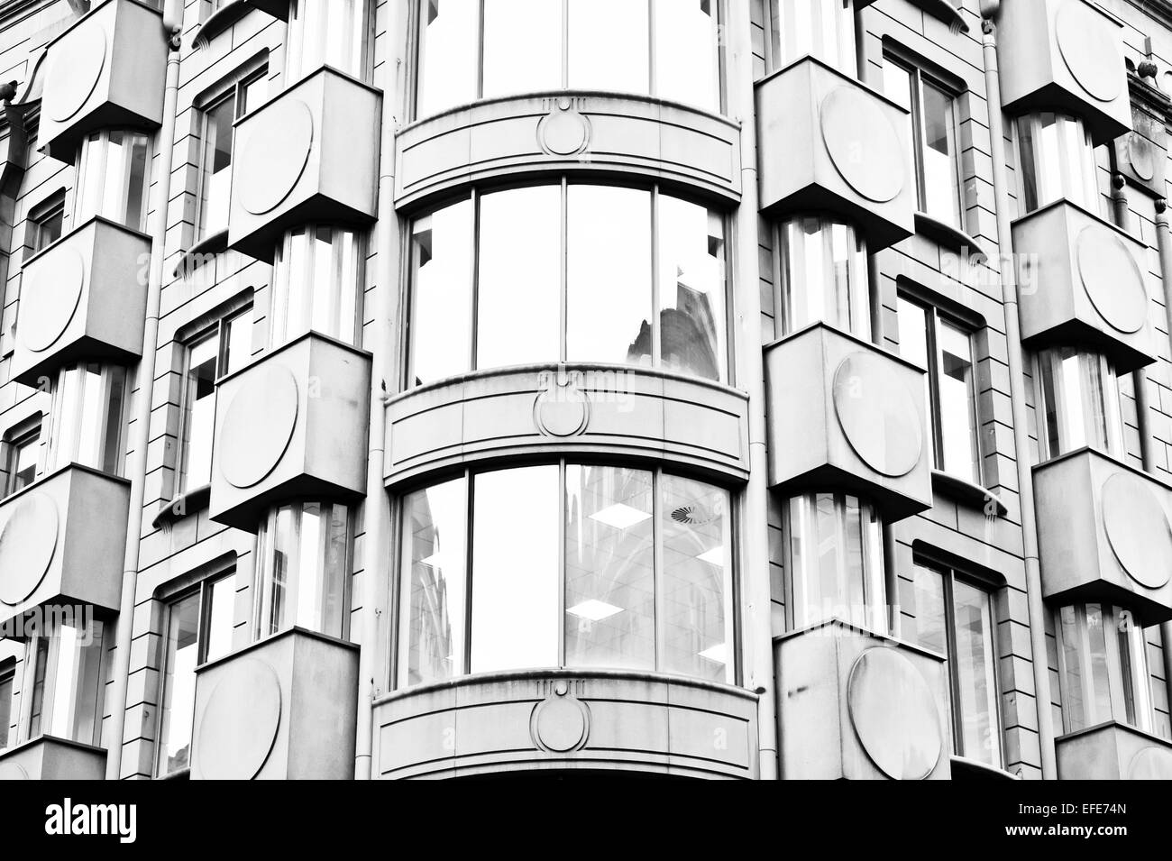 A modern office building with windows Stock Photo Alamy