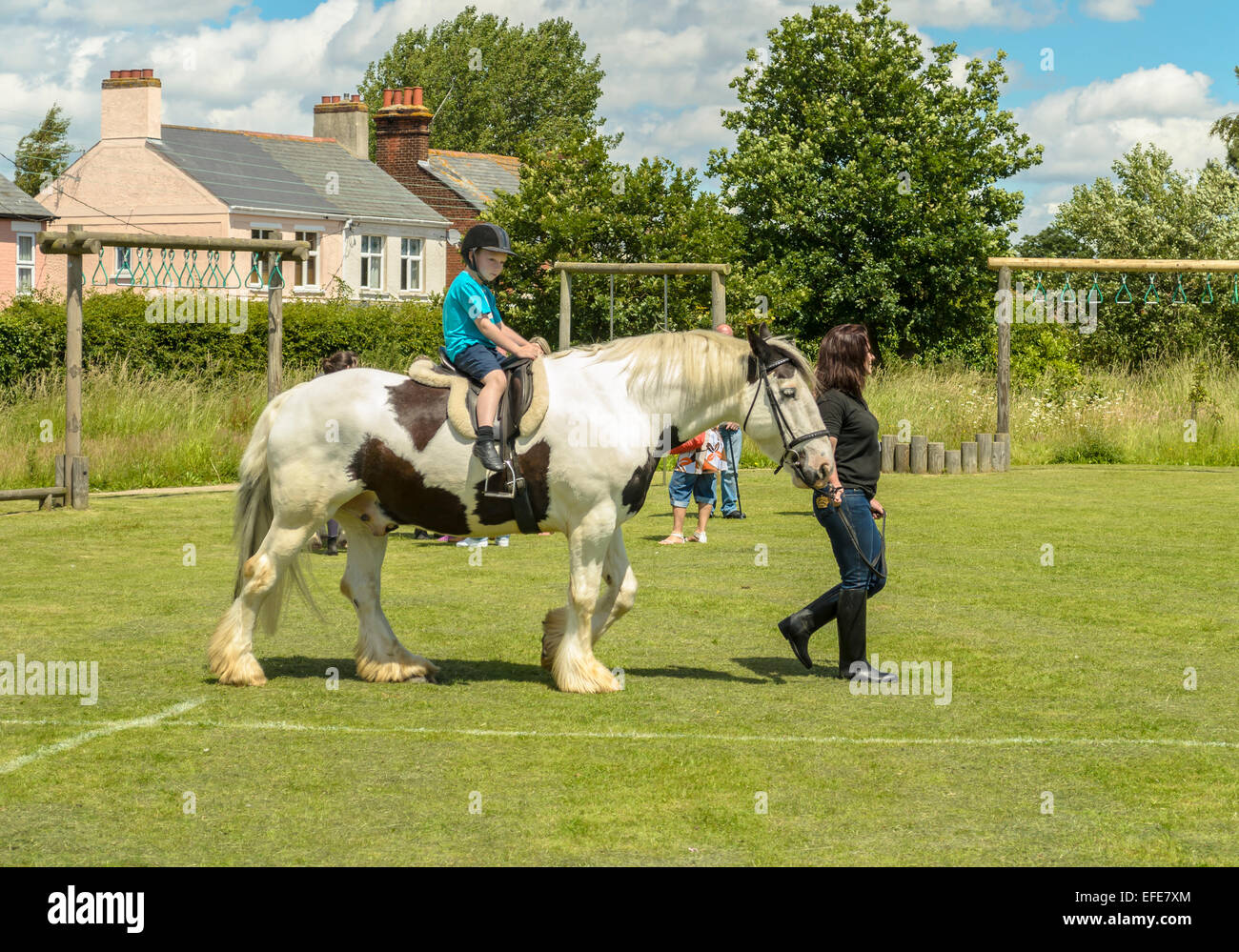 young girl sitting on a horse Essex England UK Stock Photo