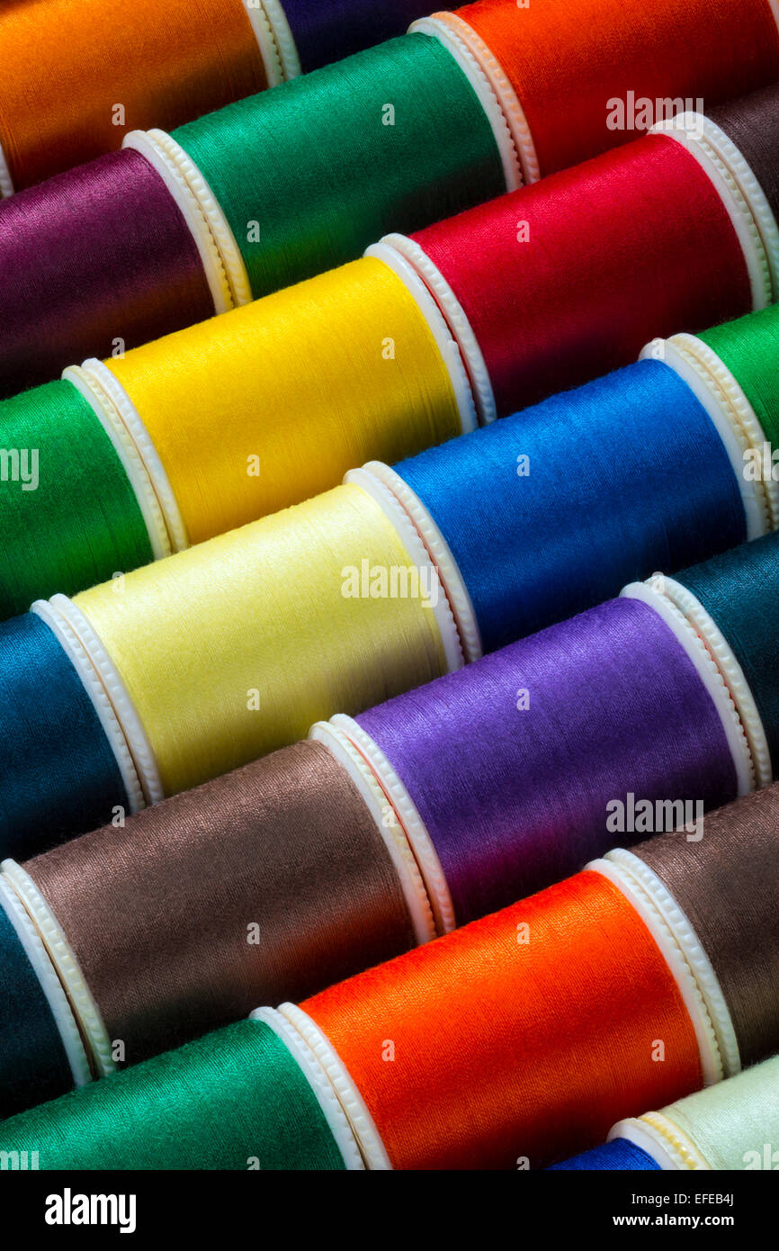 Selection of colored cotton threads used in sewing Stock Photo Alamy