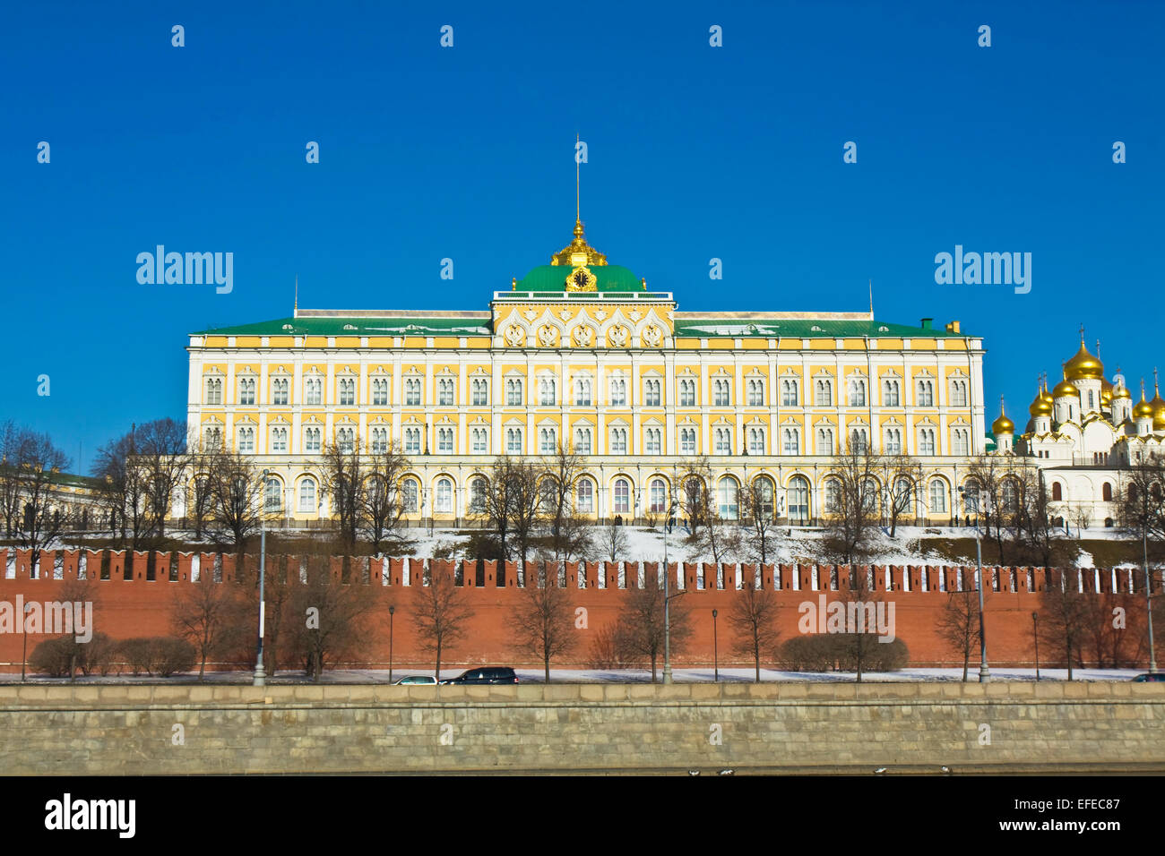 Moscow, Russia - March 10, 2012: Kremlin palace and one of Kremlin cathedrals in winter with snow. Stock Photo