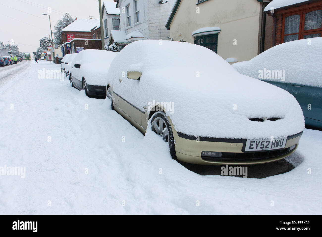 Car covered under several inches of snow parked on the A325 road in ...