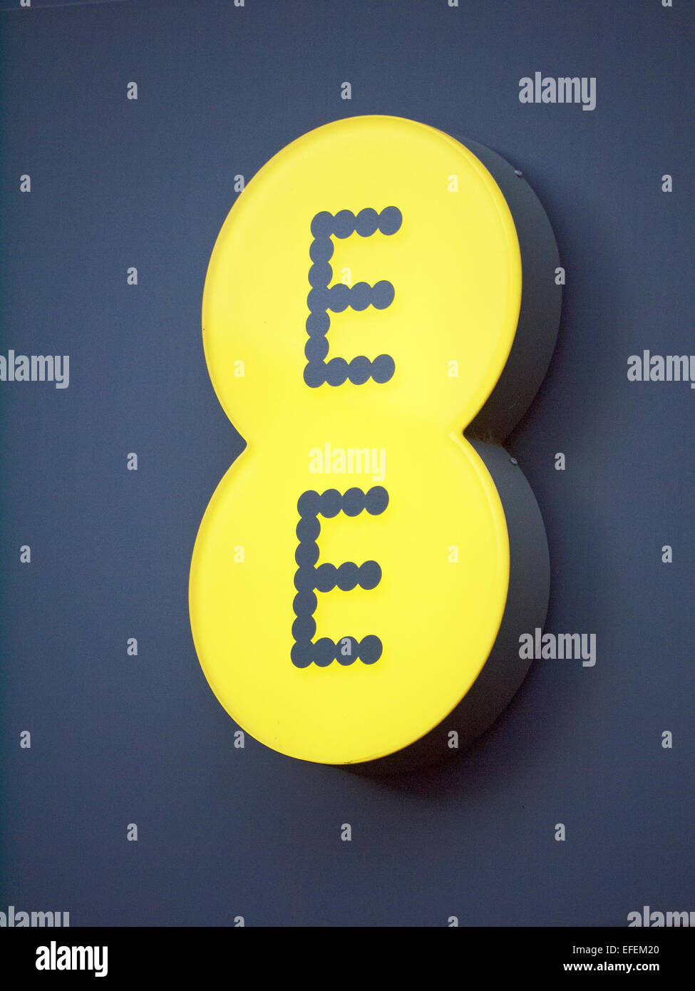 EE logo or sign for mobile network operator and internet provider UK Stock Photo