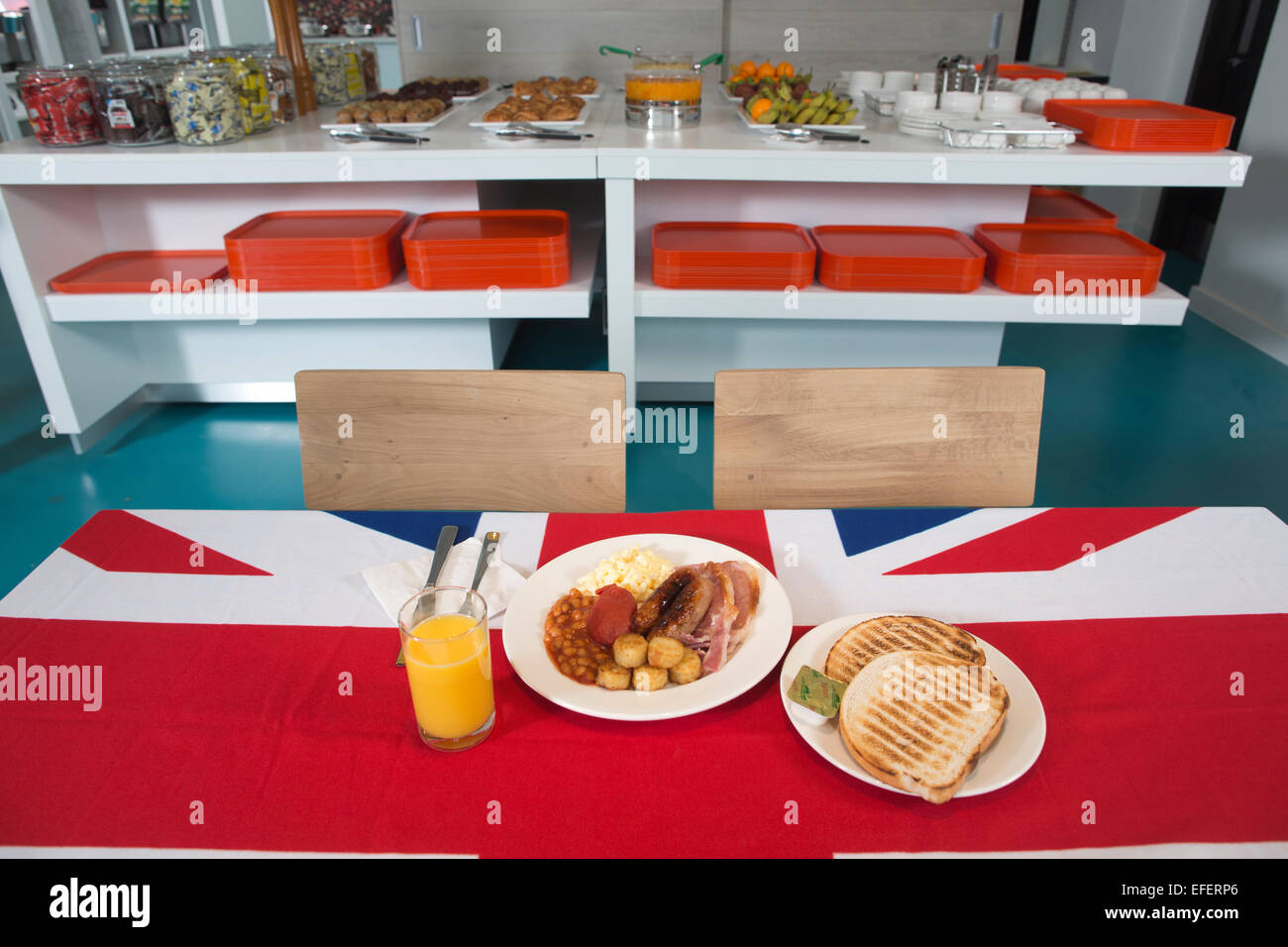 Full English Breakfast served on a Union Flag table cloth, United Kingdom Stock Photo