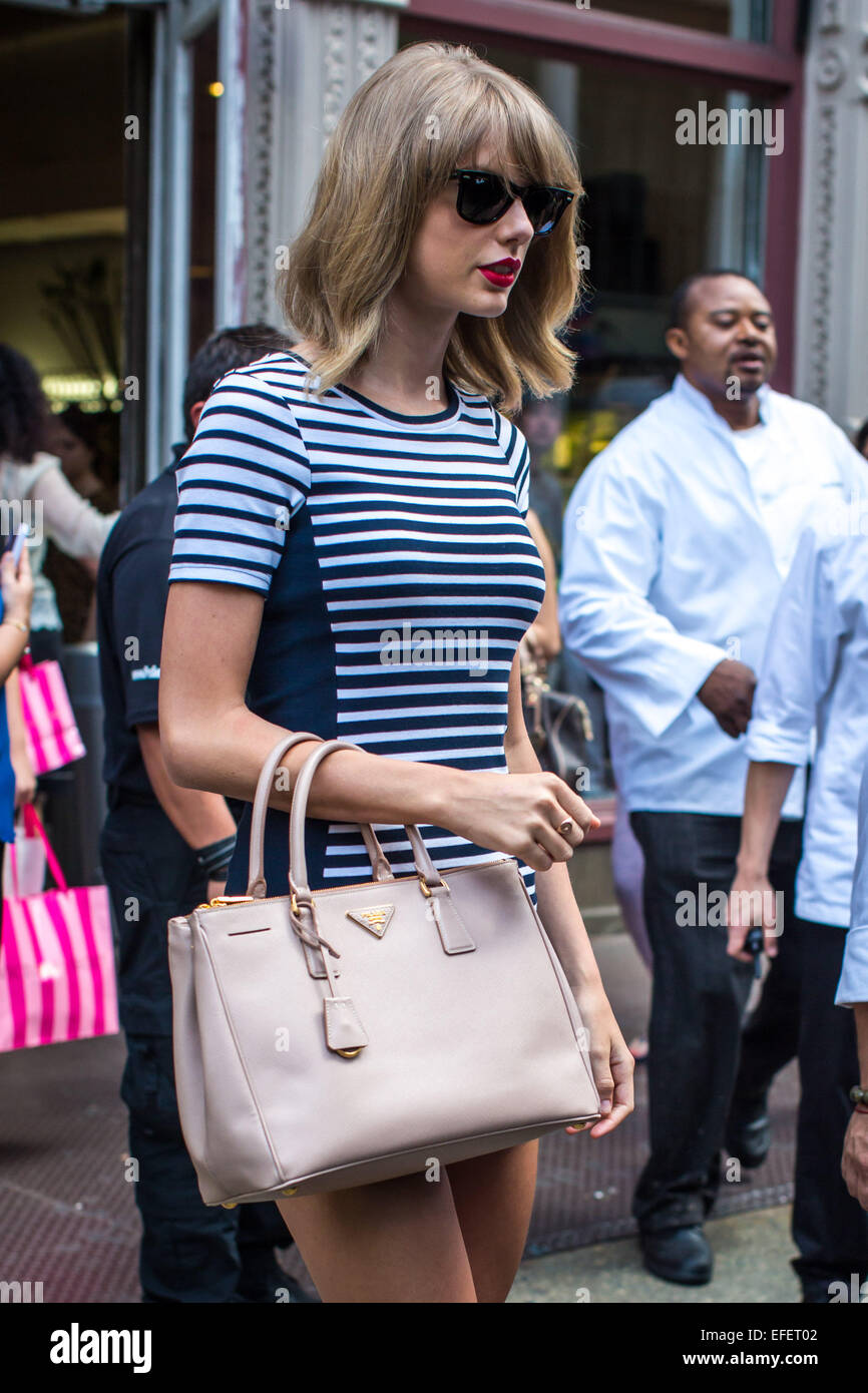 Taylor Swift seen wearing a mini dress and showing off her legs in New York City  Featuring: Taylor Swift Where: New York City, New York, United States When: 31 Jul 2014 Stock Photo