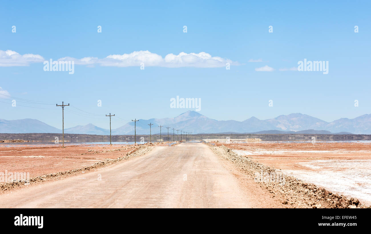 Mirages over Uyuni desert road, Altiplano, Bolivia, South America Stock Photo