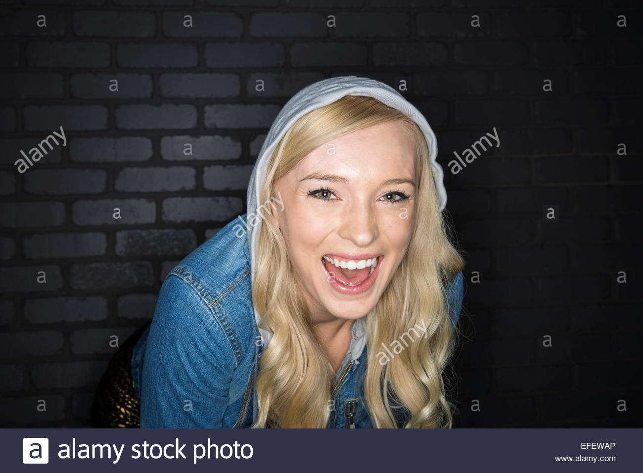 Blonde woman laughing hi-res stock photography and images - Alamy