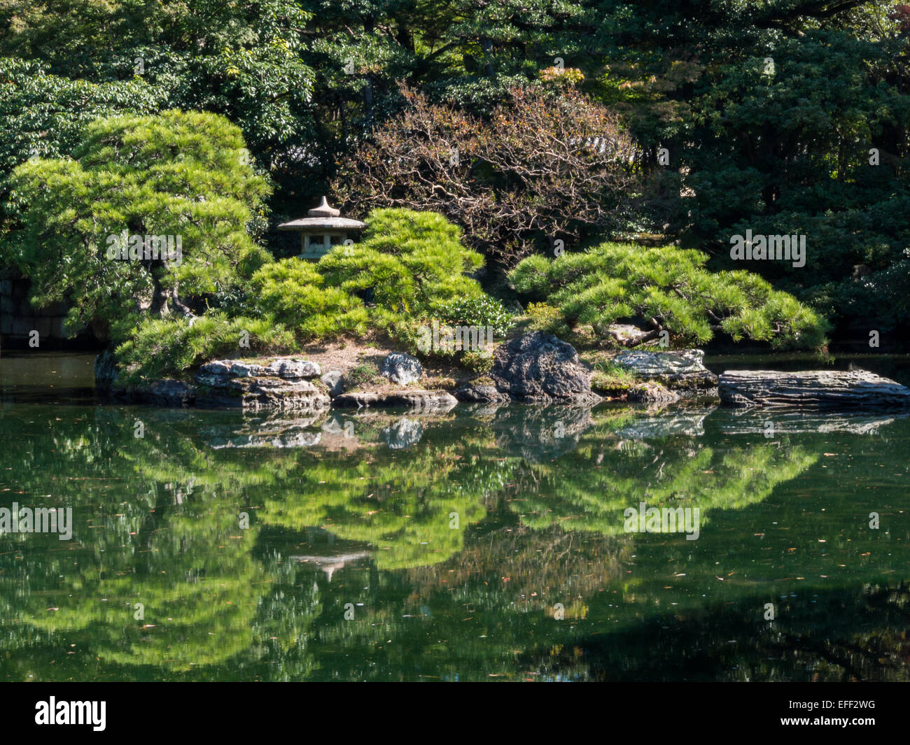 Kyoto Imperial Palace garden reflected in the lake waters Stock Photo