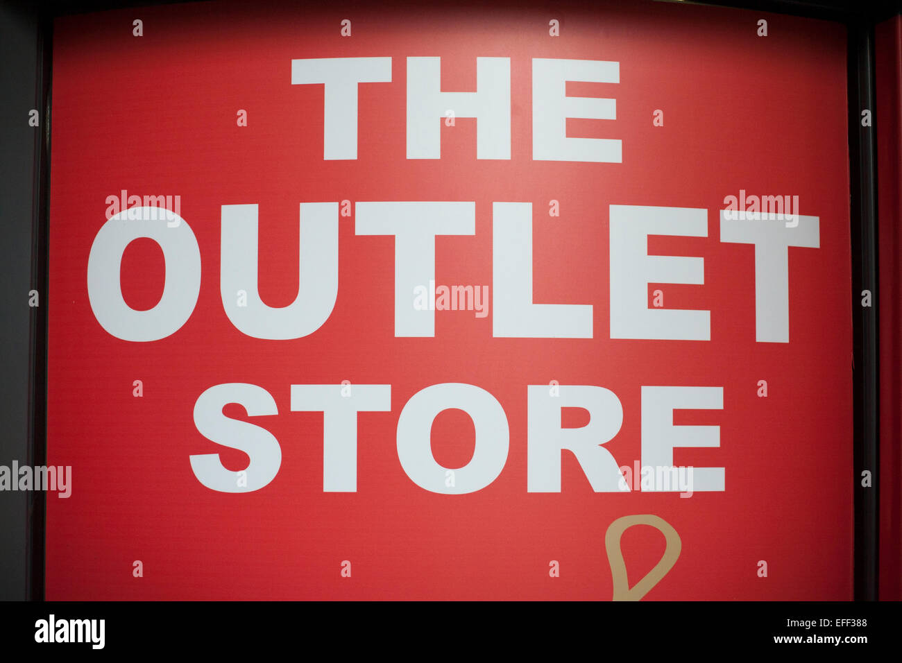 The outlet store sign in shopping centre Stock Photo Alamy