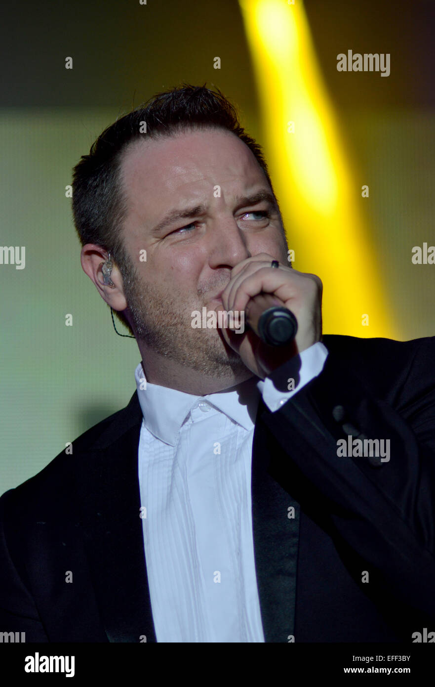 Boyzone performing live on stage at Epsom Live concert at Epsom Downs Racecourse  Featuring: Mikey Graham,Boyzone Where: Epsom, United Kingdom When: 31 Jul 2014 Stock Photo