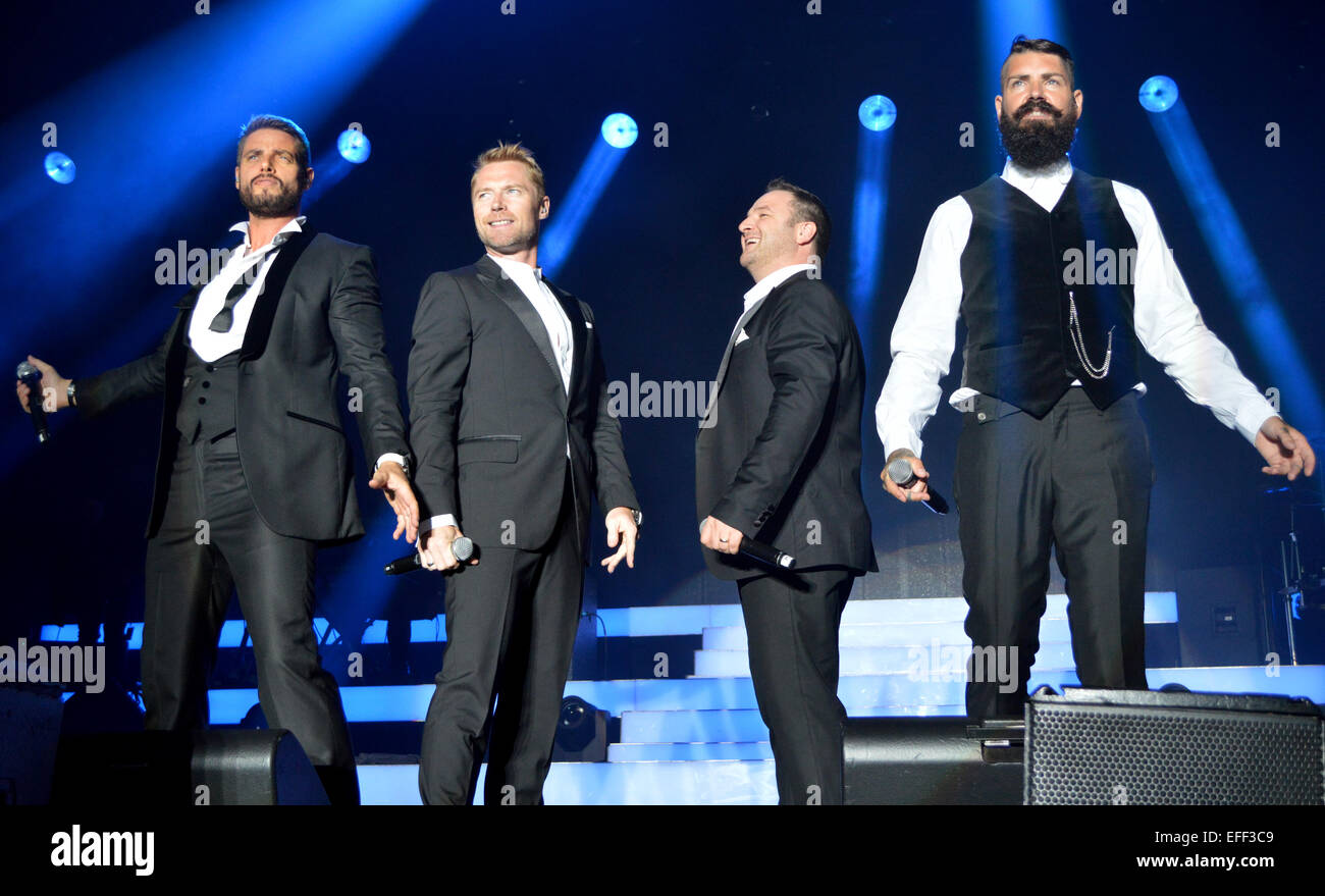 Boyzone performing live on stage at Epsom Live concert at Epsom Downs Racecourse  Featuring: Ronan Keating,Keith Duffy,Shane Lynch,Mikey Graham,Boyzone Where: Epsom, United Kingdom When: 31 Jul 2014 Stock Photo