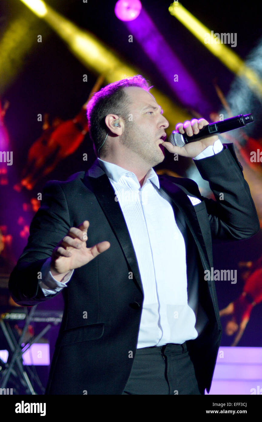 Boyzone performing live on stage at Epsom Live concert at Epsom Downs Racecourse  Featuring: Mikey Graham,Boyzone Where: Epsom, United Kingdom When: 31 Jul 2014 Stock Photo