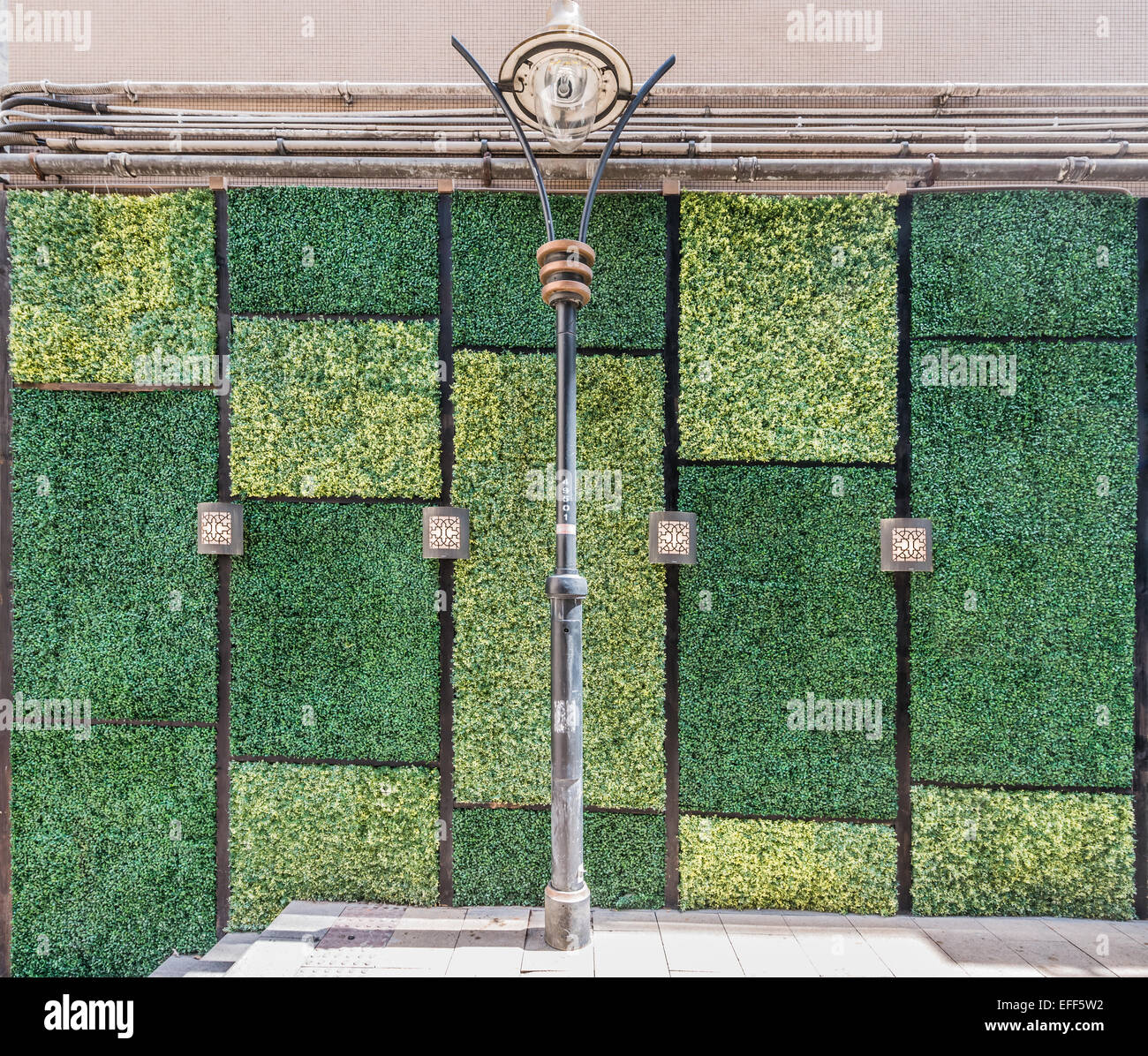 grass wall wall doors entrance design at Soho Central in Hong Kong ...