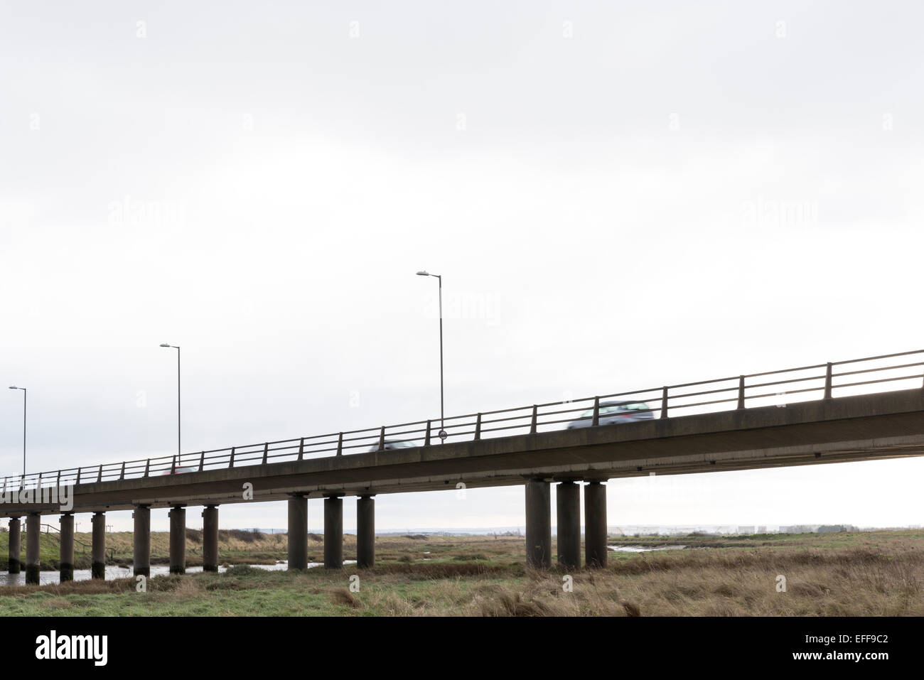 A concrete road bridge across East Haven at Benfleet, Essex.  The road is the A130, the Canvey Way. Stock Photo
