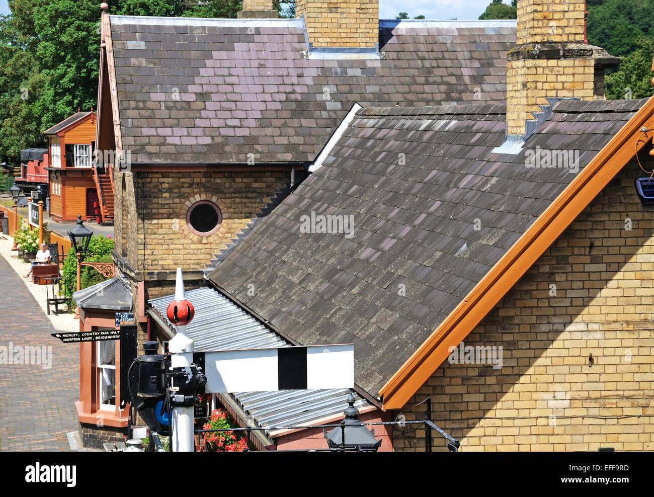 Elevated view of the railway station and platform with a semaphore railway signal in the foreground, Arley, England, UK. Stock Photo