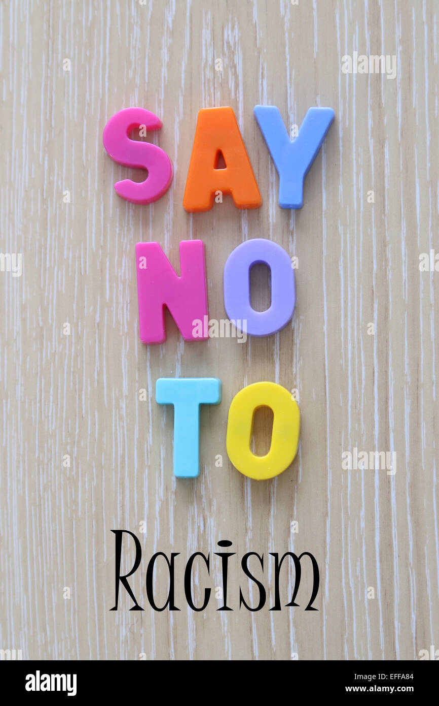 SAY NO TO  Racism spelled using Magnetic Uppercase Letters, where 'Racism' is added digitally Stock Photo