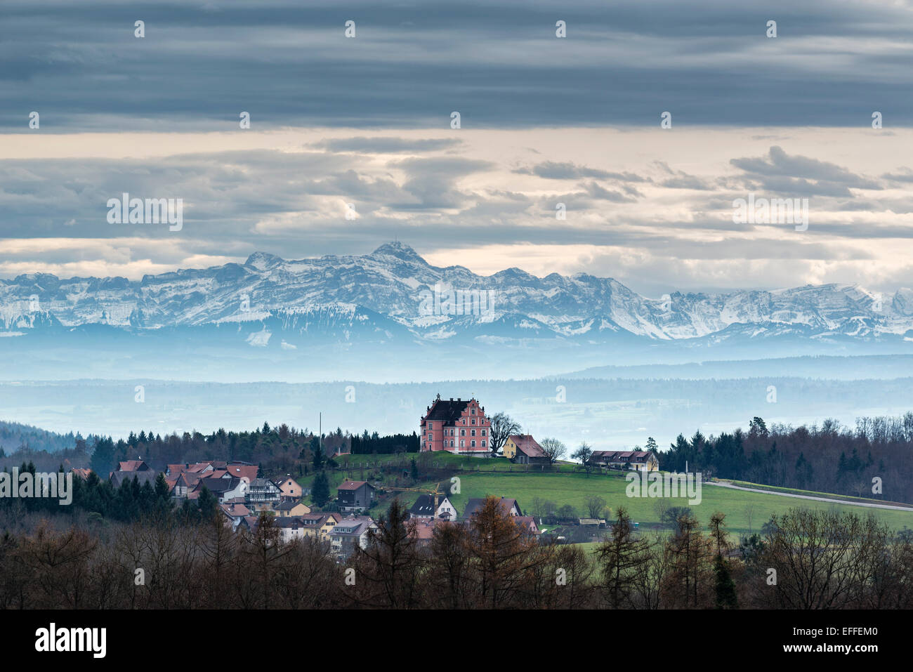 Germany, Baden-Wuerttemberg, Constance district, View over Bodanrueck to Freudental Castle, in the backgrount Swiss Alps with Saentis, Foehn clouds Stock Photo